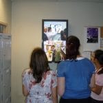 digital signage student area watching